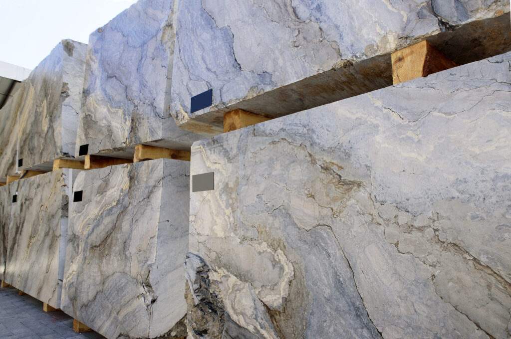 Blocks of marble stacked and ready to be cut into slabs