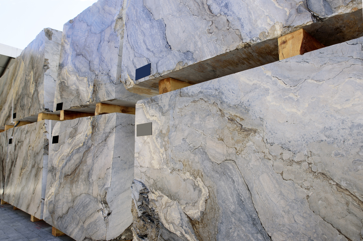 Blocks of marble stacked and ready to be cut into slabs
