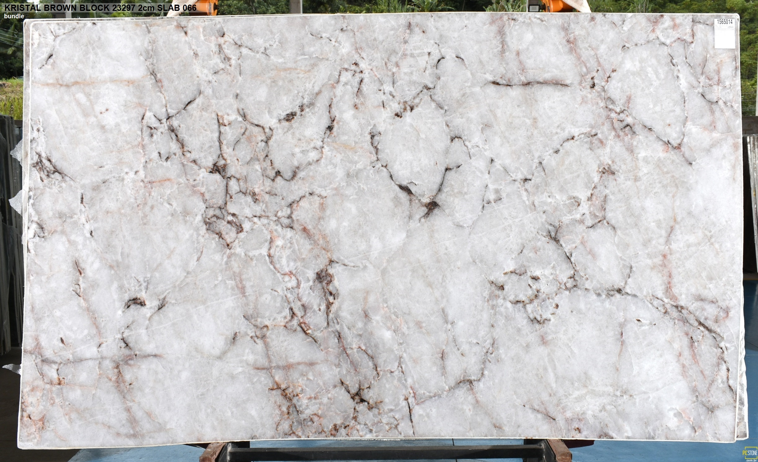 Crystallo Viola Quartzite slab featuring a luminous white base with golden and violet-gray veining — luxurious Brazilian quartzite ideal for countertops and statement interiors.