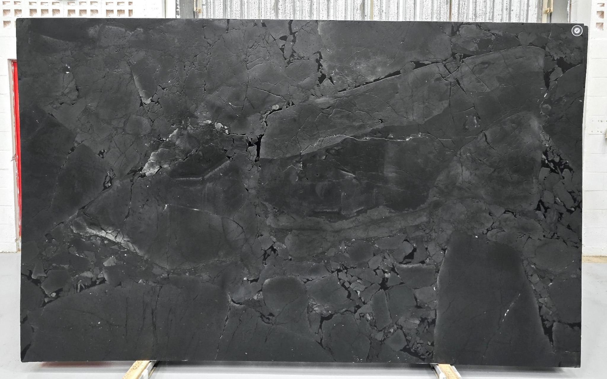 Negresco granite slab with black background and white veining, ideal for modern luxury kitchens.