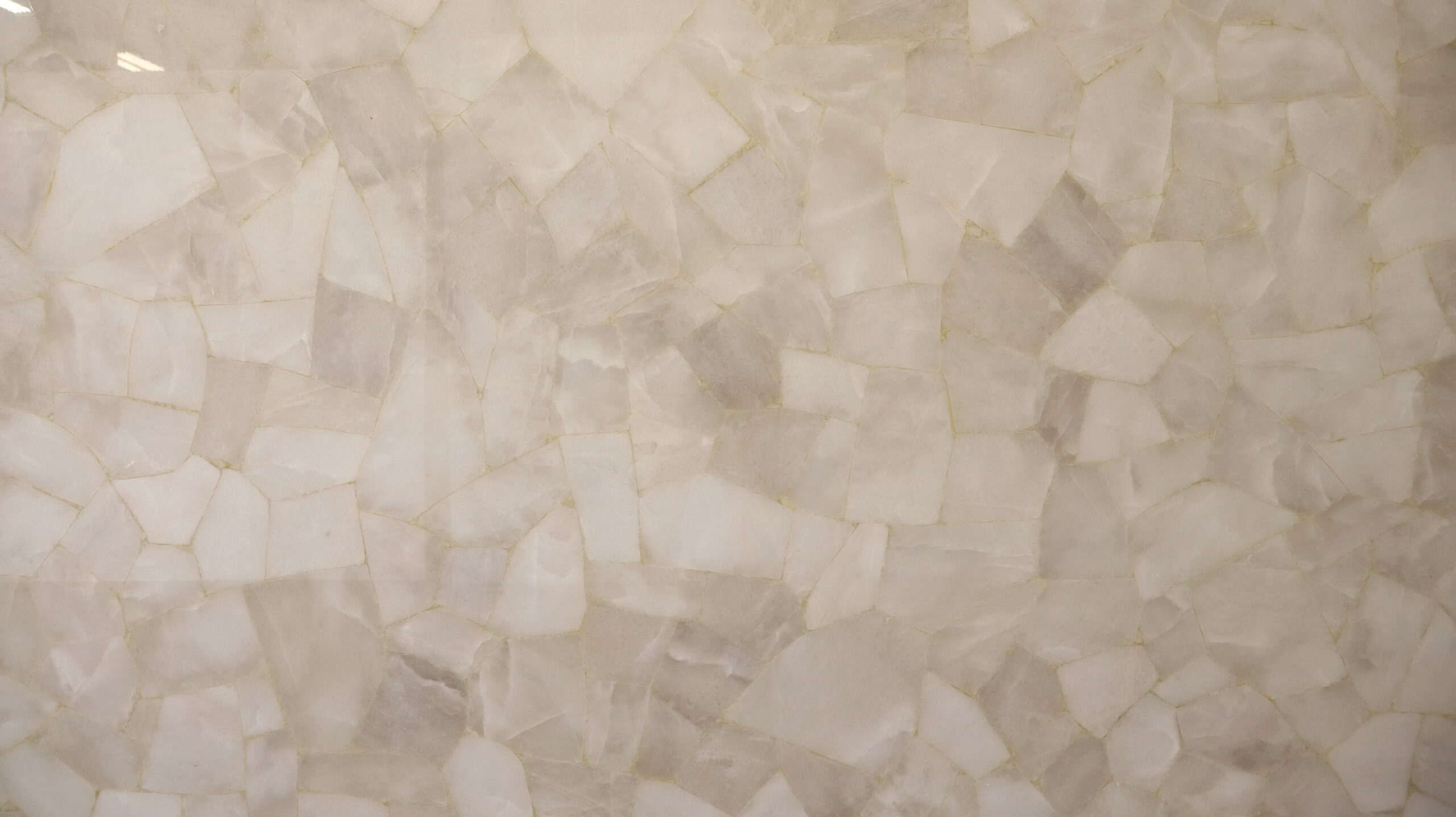 Semi-precious stone quartz mosaic slab. Great for statement countertops, waterfall islands, bars, showers, and more!